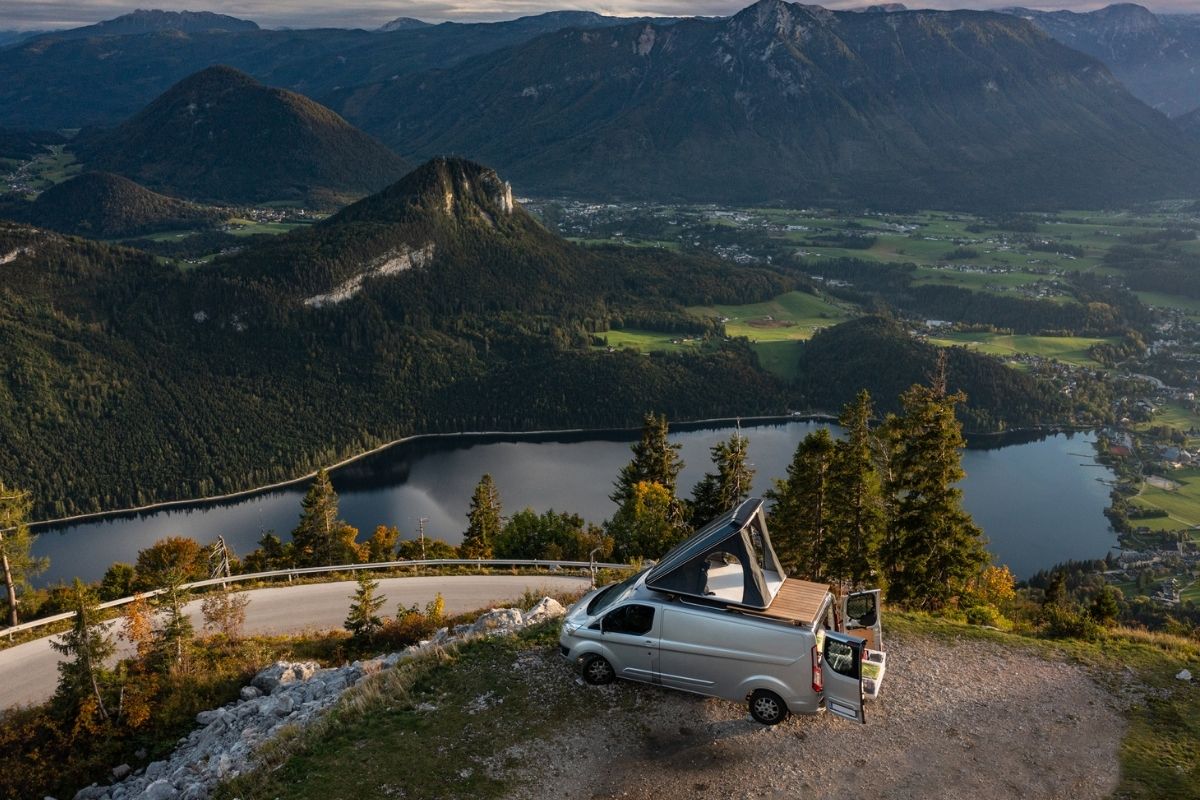 Aerial View Camper Van Alone Near Mountain Road